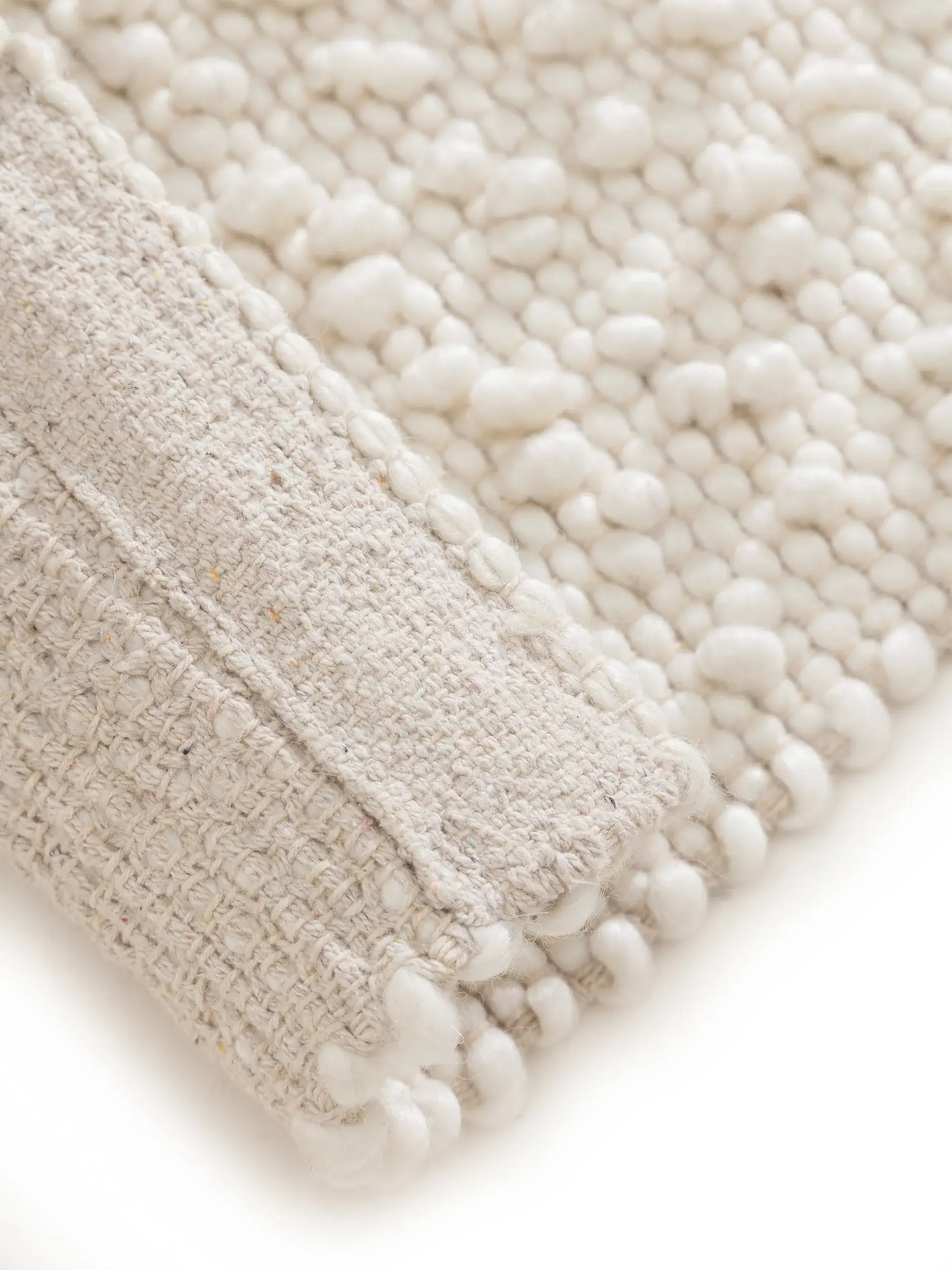 Rug made of 70% Wolle, 15% Jute, 15% Baumwolle in Beige with a 70% Wolle, 15% Jute, 15% Baumwolle high pile by benuta Pure