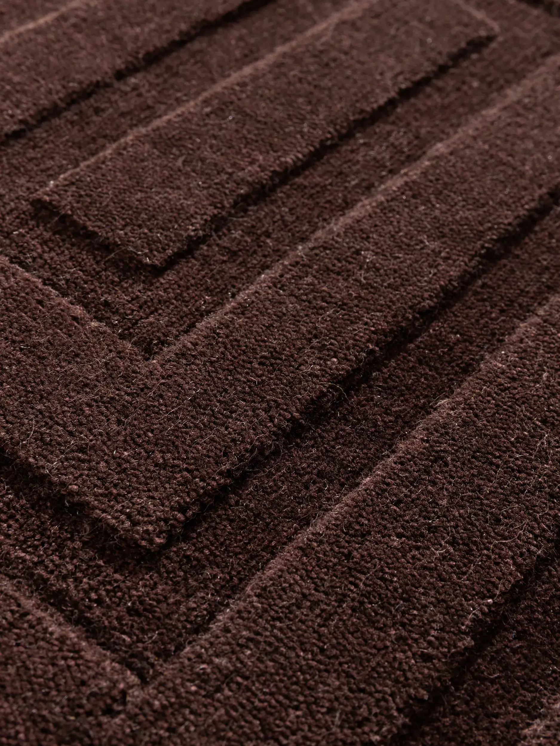 Teppich aus 50% Wolle, 50% Viskose in Rot mit 50% Wolle, 50% Viskose hohem Flor von benuta Finest
