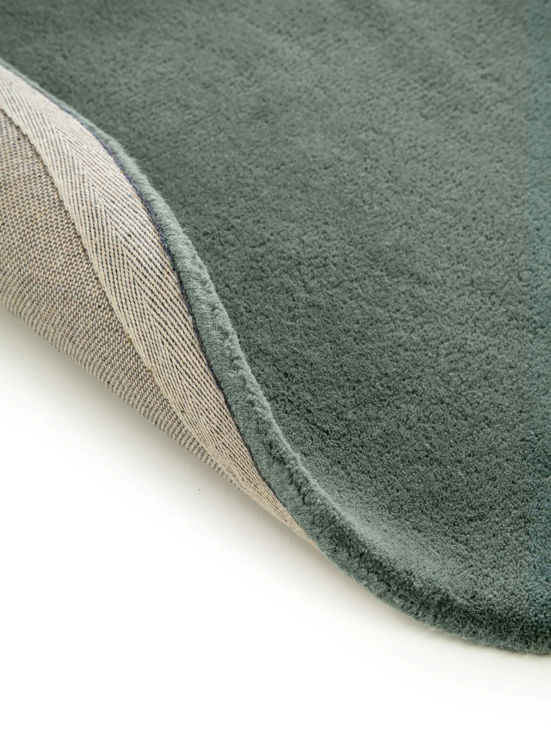 Teppich aus 100% Wolle in Grün mit 100% Wolle hohem Flor von benuta Nest