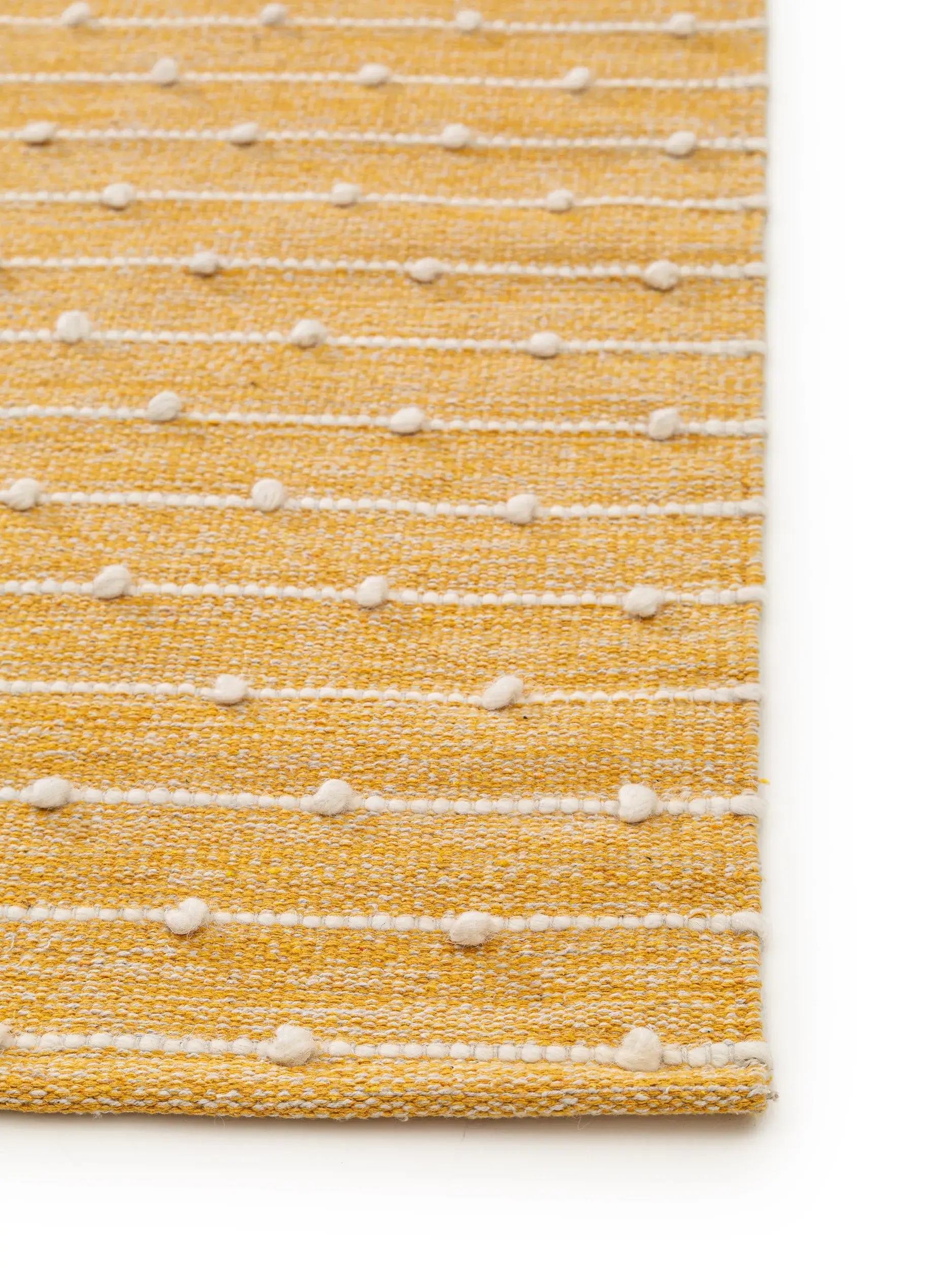 Teppich aus 80% Baumwolle, 20% Wolle in Gelb mit 80% Baumwolle, 20% Wolle hohem Flor von Lytte