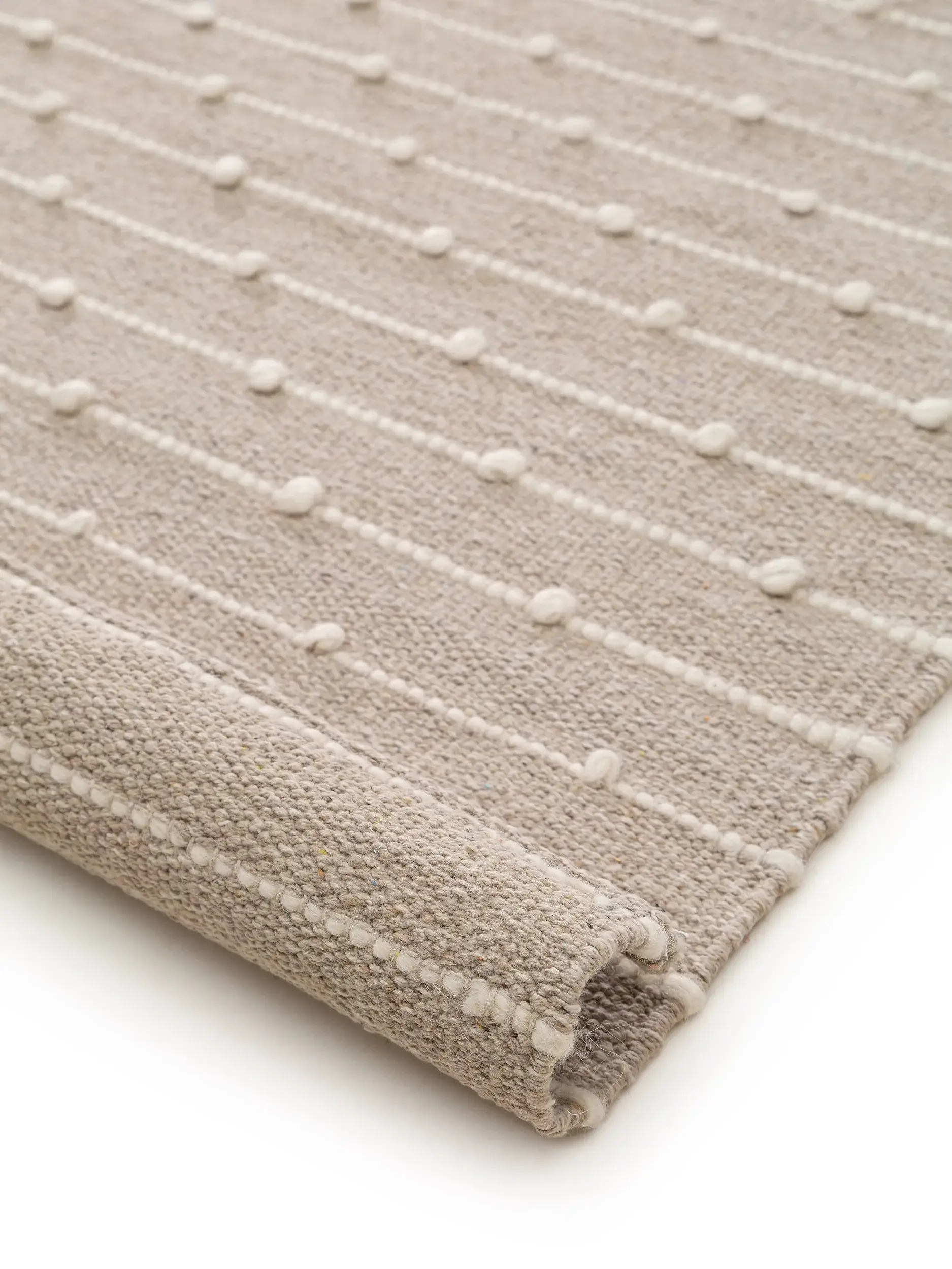 Rug made of 80% Baumwolle, 20% Wolle in Beige with a 80% Baumwolle, 20% Wolle high pile by Lytte