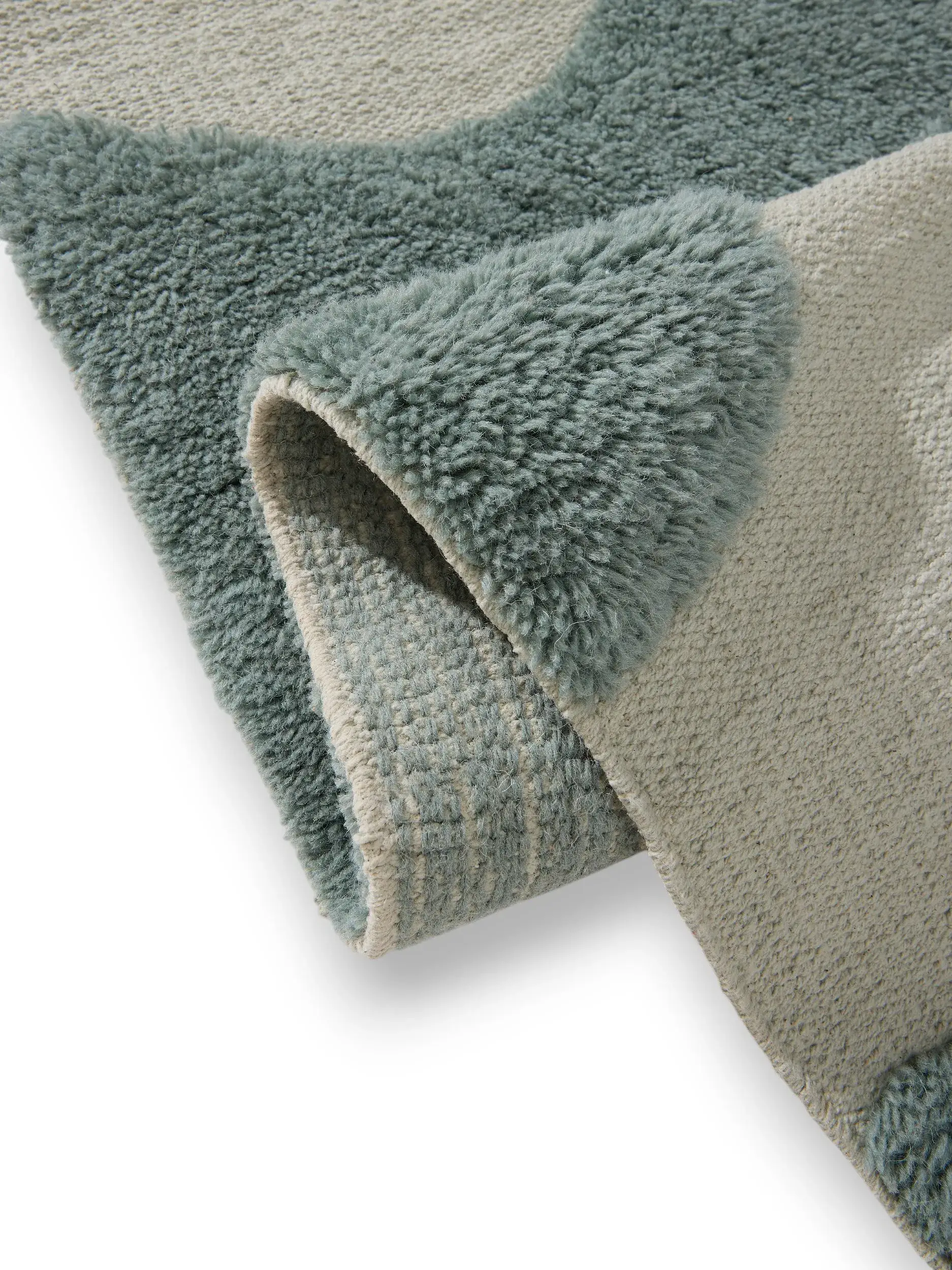 Rug made of 60% Baumwolle, 40% Wolle in Grün with a 60% Baumwolle, 40% Wolle high pile by Lytte