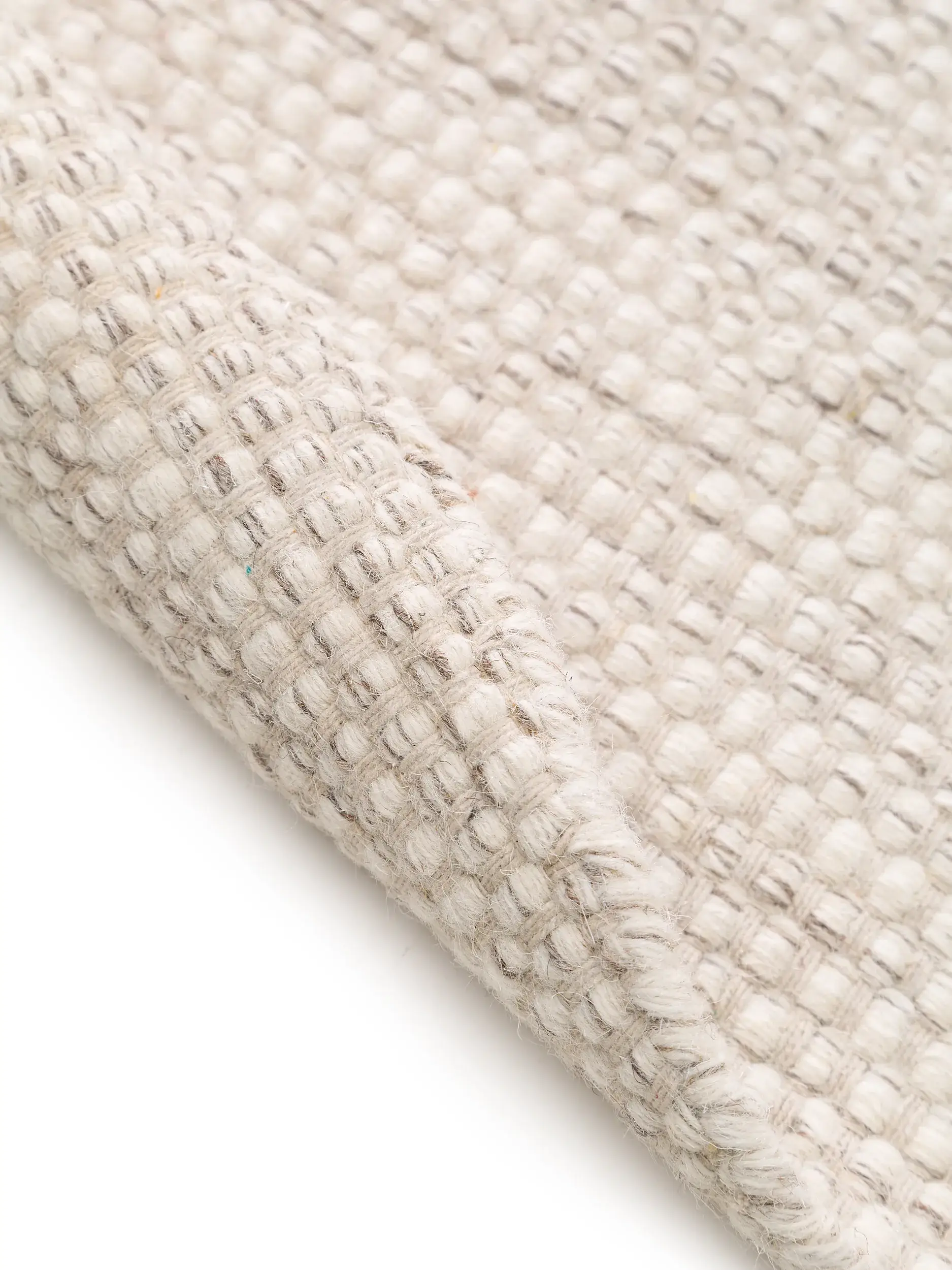 Rug made of 80% Wolle, 20% Baumwolle in Beige with a 80% Wolle, 20% Baumwolle high pile by benuta Pure