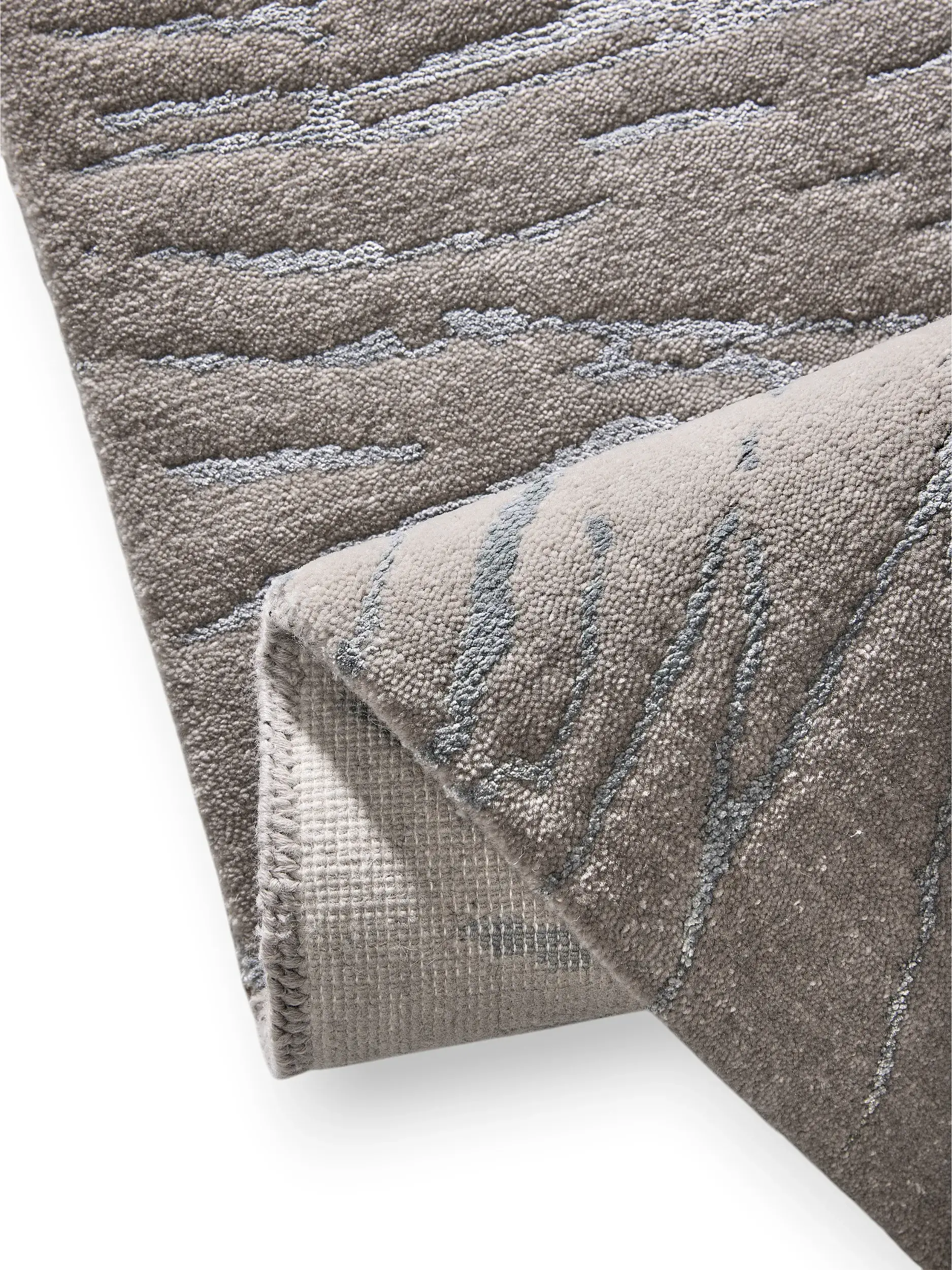 Teppich aus 60% Viscose, 40% Wool in Blue mit 60% Viscose, 40% Wool hohem Flor von benuta Finest