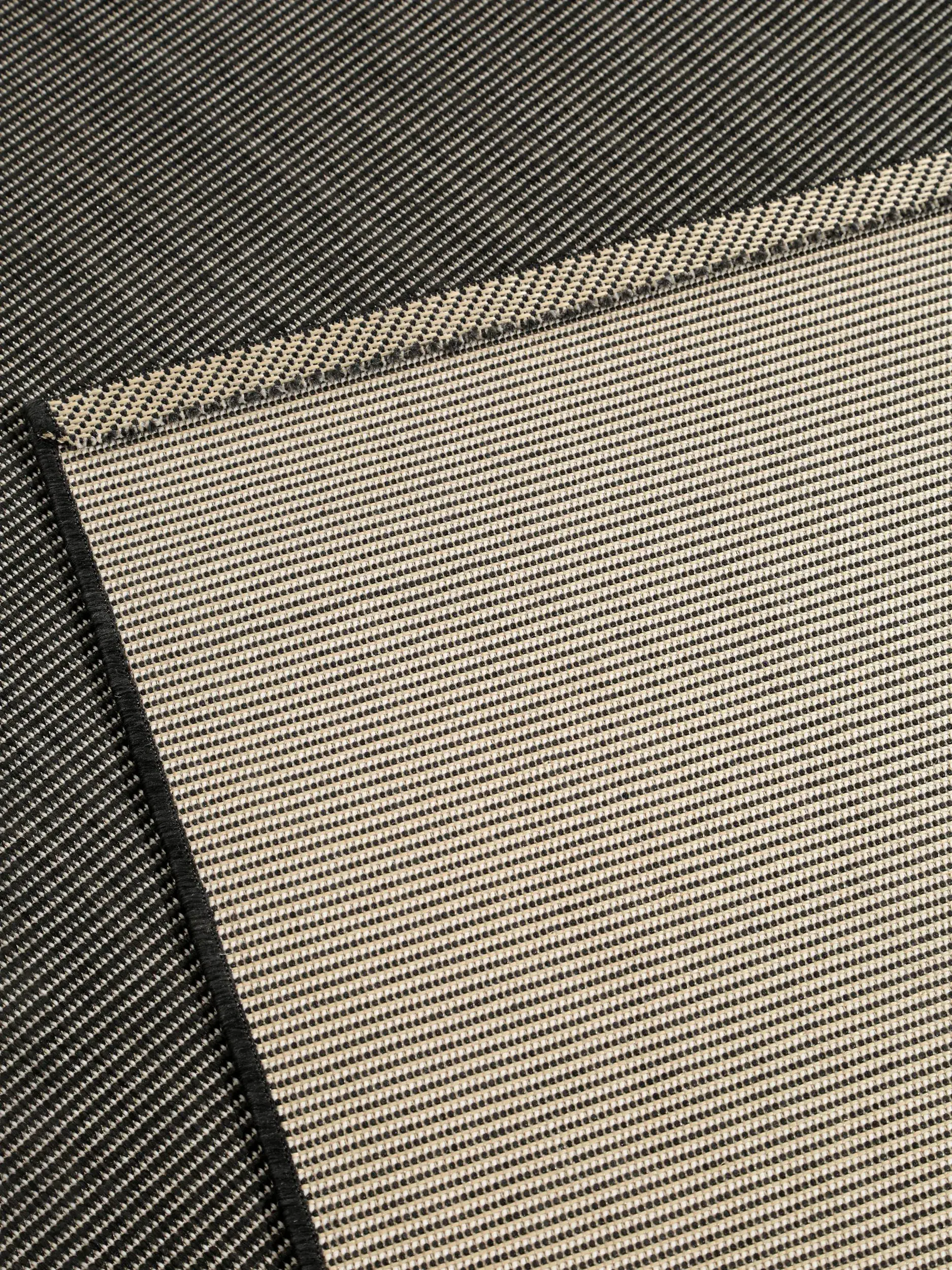 Rug made of 100% Polypropylen in Schwarz with a 100% Polypropylen high pile by benuta Nest