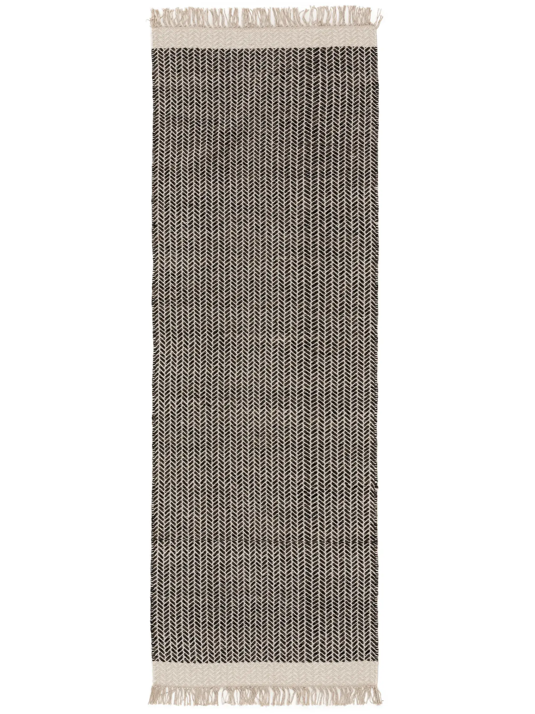 Matto 60% Wolle, 40% Baumwollea värissä Schwarz/Weiß 60% Wolle, 40% Baumwolle korkealla nukalla merkiltä benuta Pure