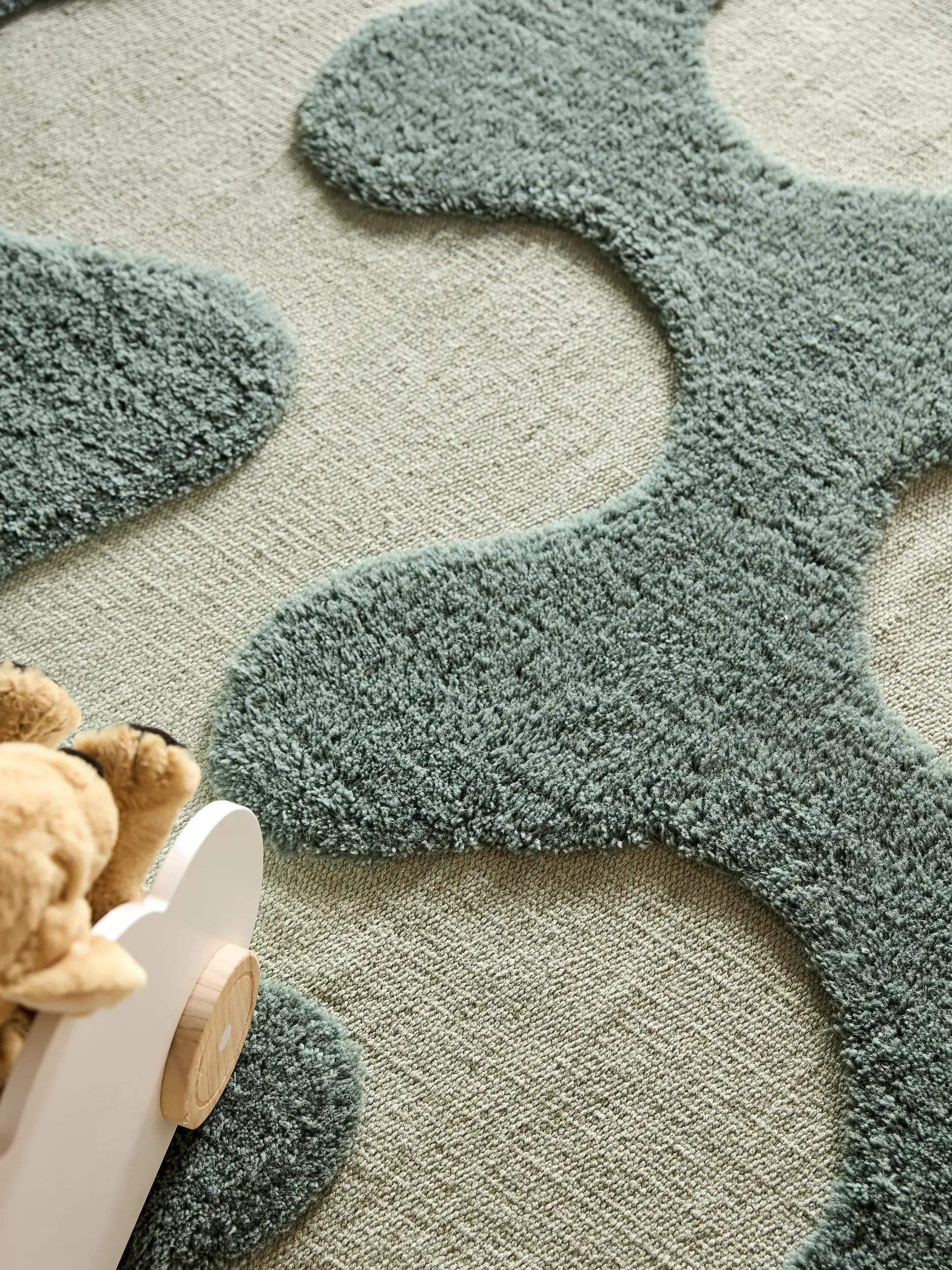 Rug made of 60% Baumwolle, 40% Wolle in Grün with a 60% Baumwolle, 40% Wolle high pile by Lytte