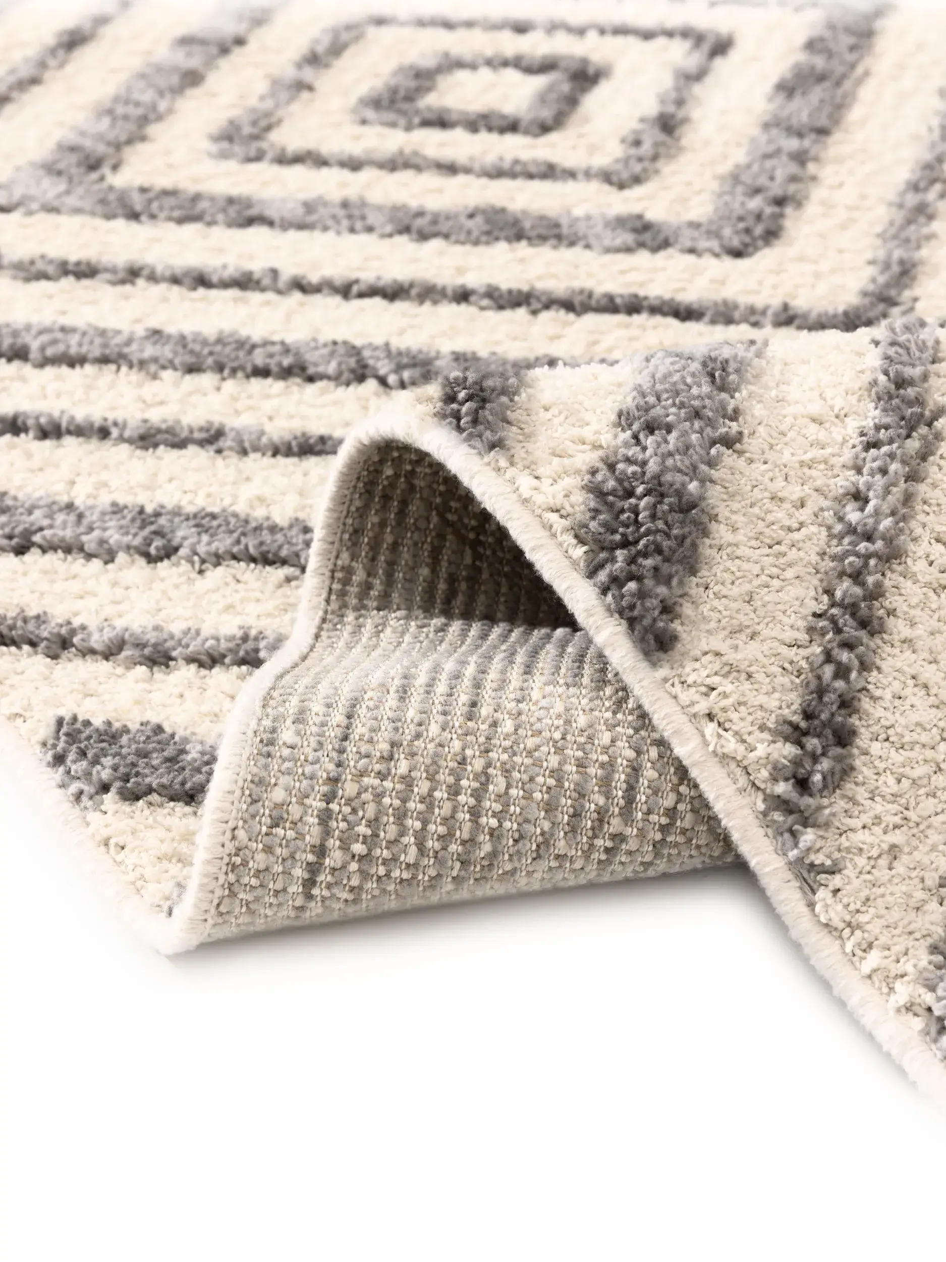 Rug made of 100% Polyester in White with a 100% Polyester high pile by benuta Pop