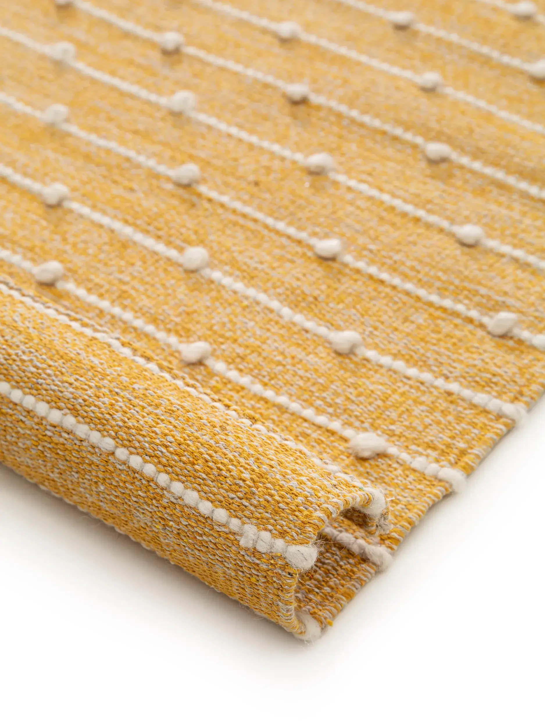 Teppich aus 80% Baumwolle, 20% Wolle in Gelb mit 80% Baumwolle, 20% Wolle hohem Flor von Lytte