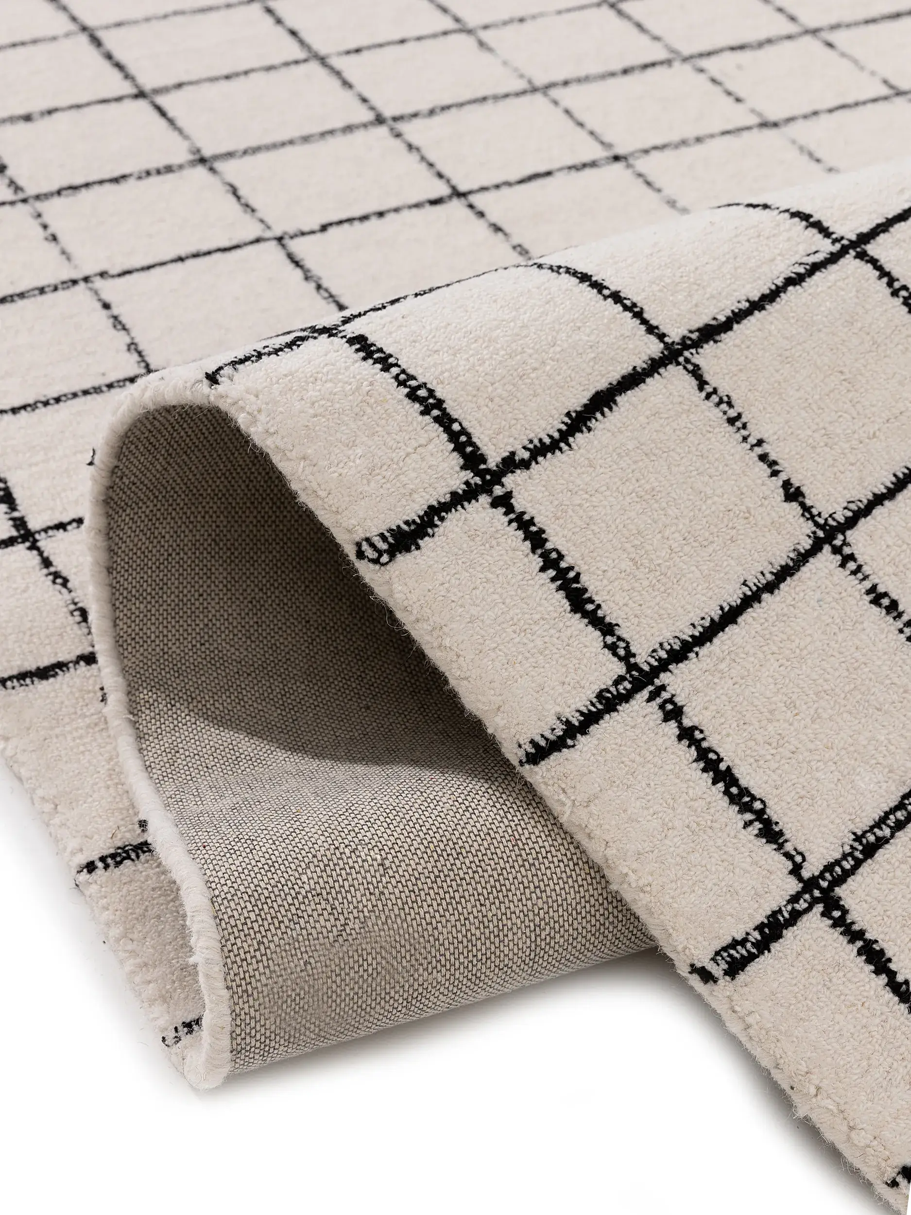 Teppich aus 100% Wolle in Schwarz/Weiß mit 100% Wolle hohem Flor von benuta Pop