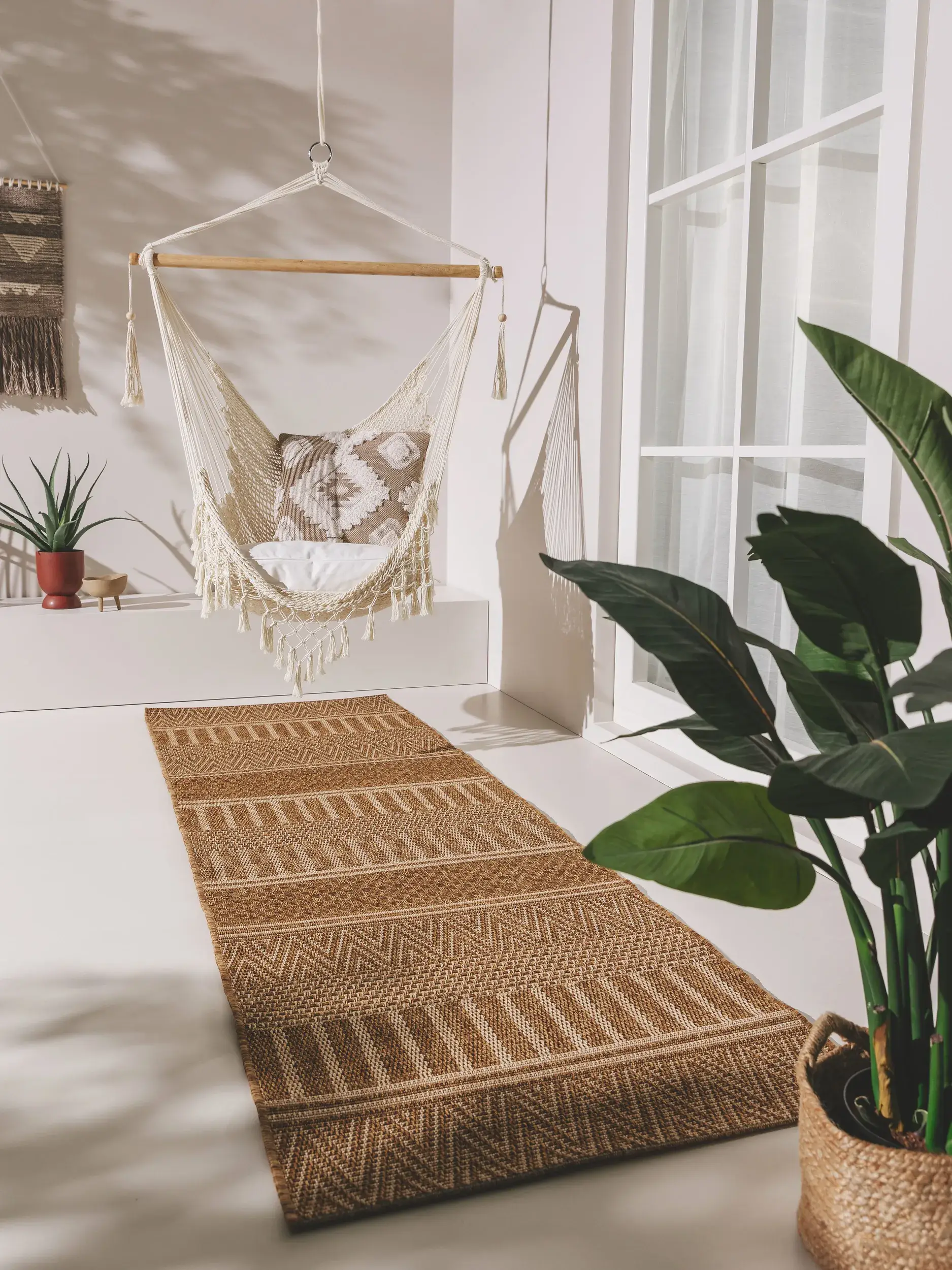 Rug made of 100% Polypropylen in Brown with a 100% Polypropylen high pile by benuta Nest