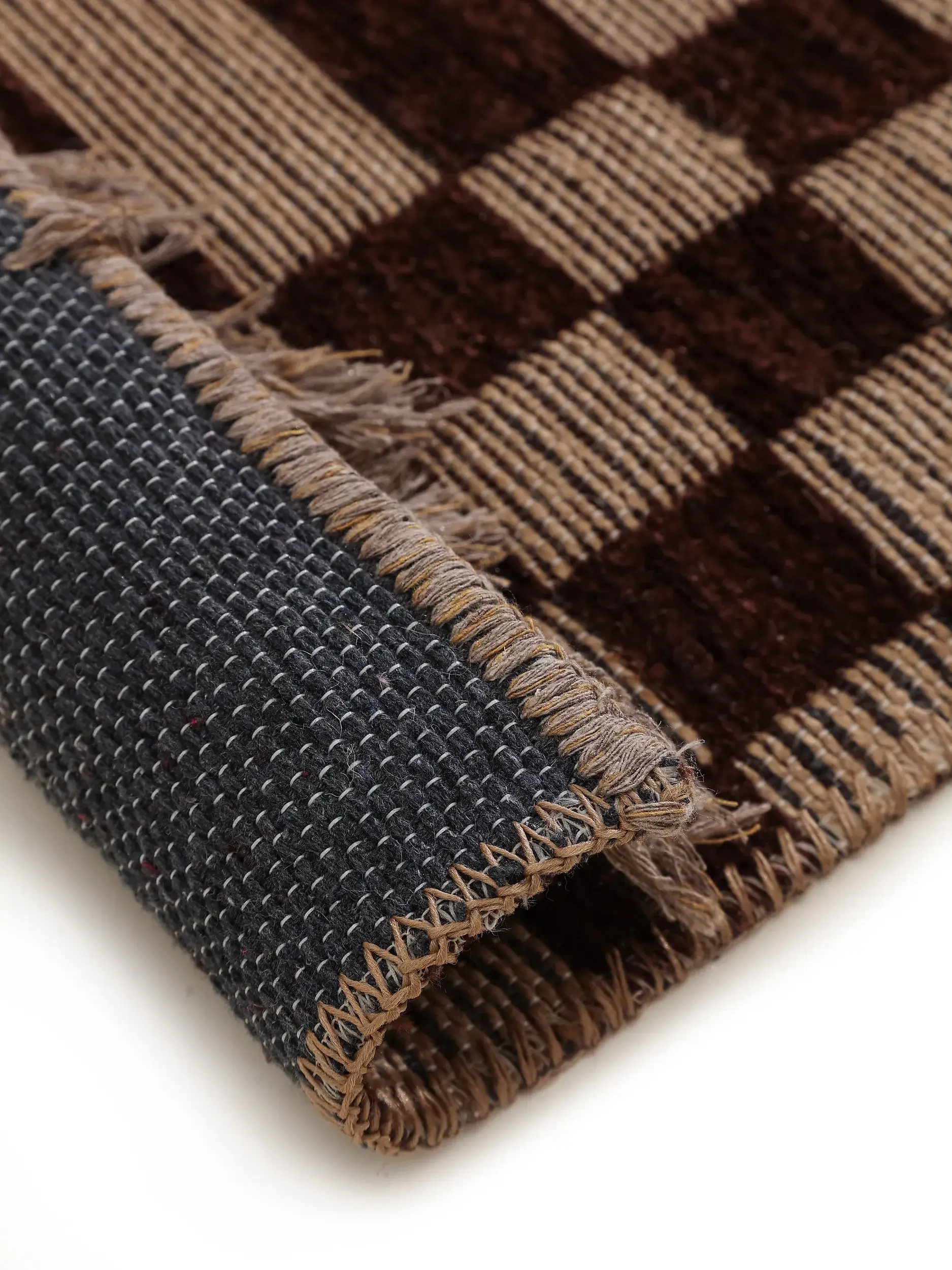 Rug made of 55% Cotton (recycled), 30% Jute, 15% Polyester in Brown with a 55% Cotton (recycled), 30% Jute, 15% Polyester high pile by benuta Pure