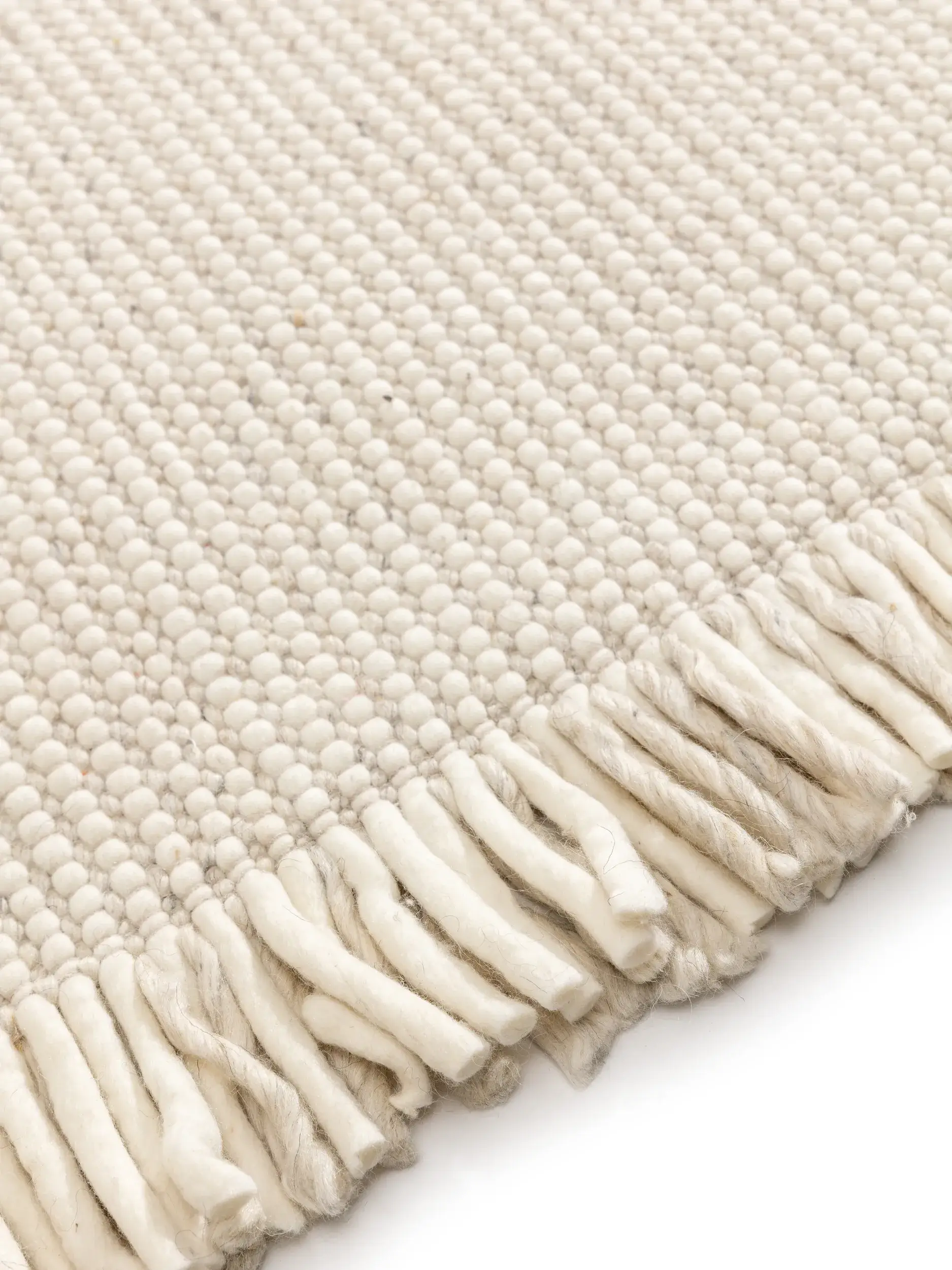 Matto 60% Wolle, 25% Polyester, 15% Viskosea värissä Beige 60% Wolle, 25% Polyester, 15% Viskose korkealla nukalla merkiltä benuta Pure