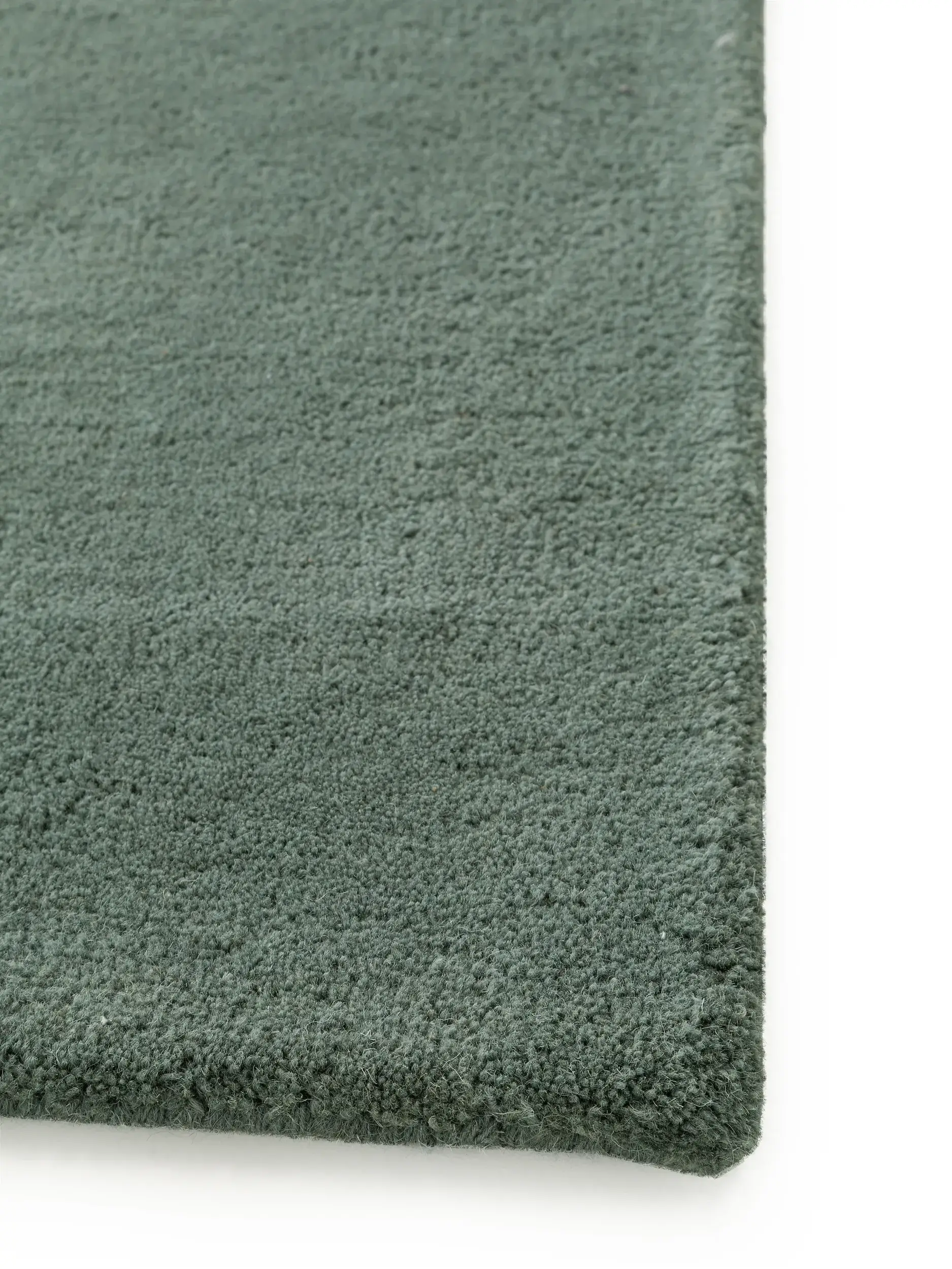 Teppich aus 100% Wolle in Grün mit 100% Wolle hohem Flor von benuta Nest