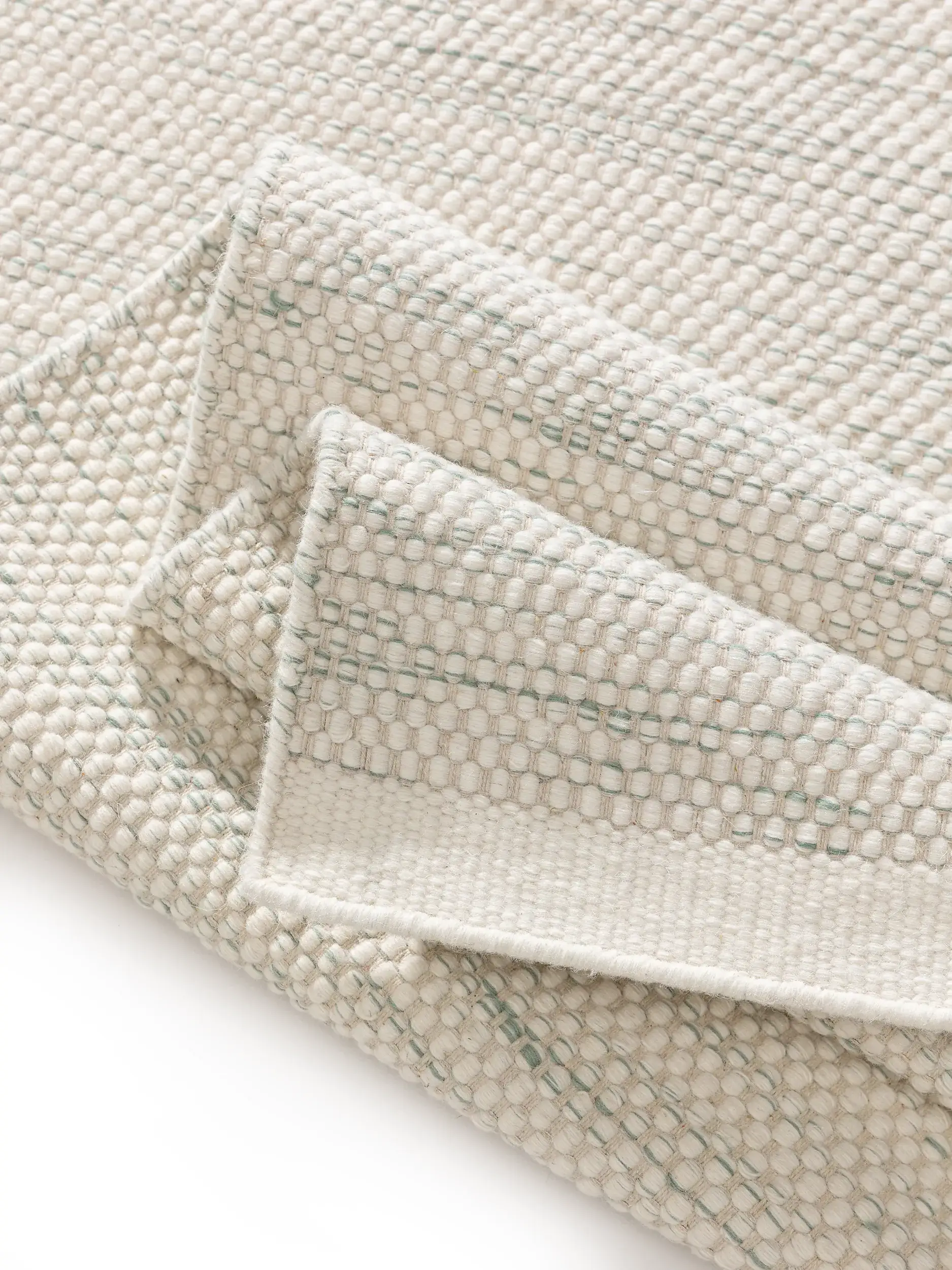 Rug made of 100% Wool in Green with a 100% Wool high pile by Lytte