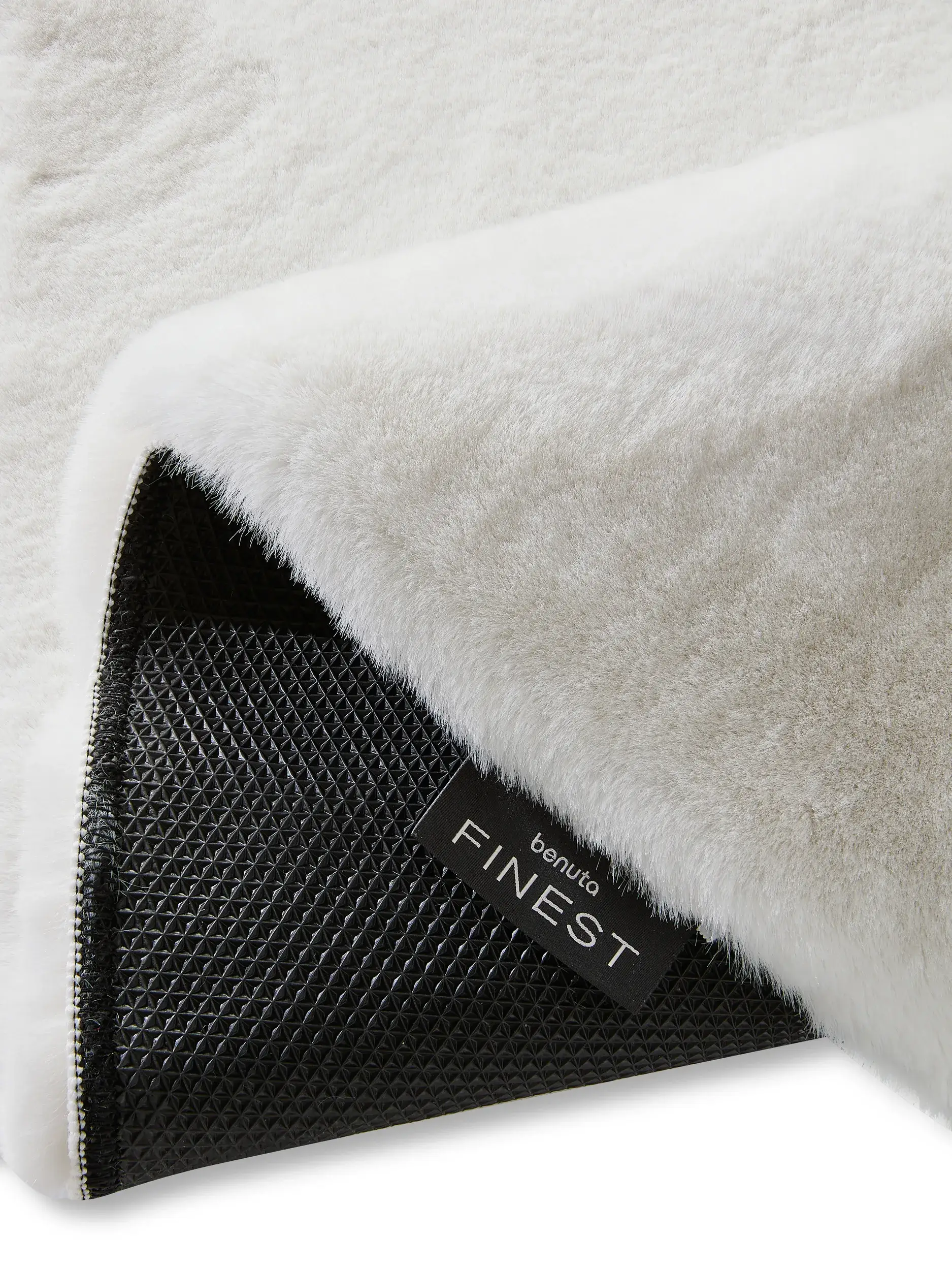 Rug made of 100% Polyester in White with a 100% Polyester high pile by benuta Finest