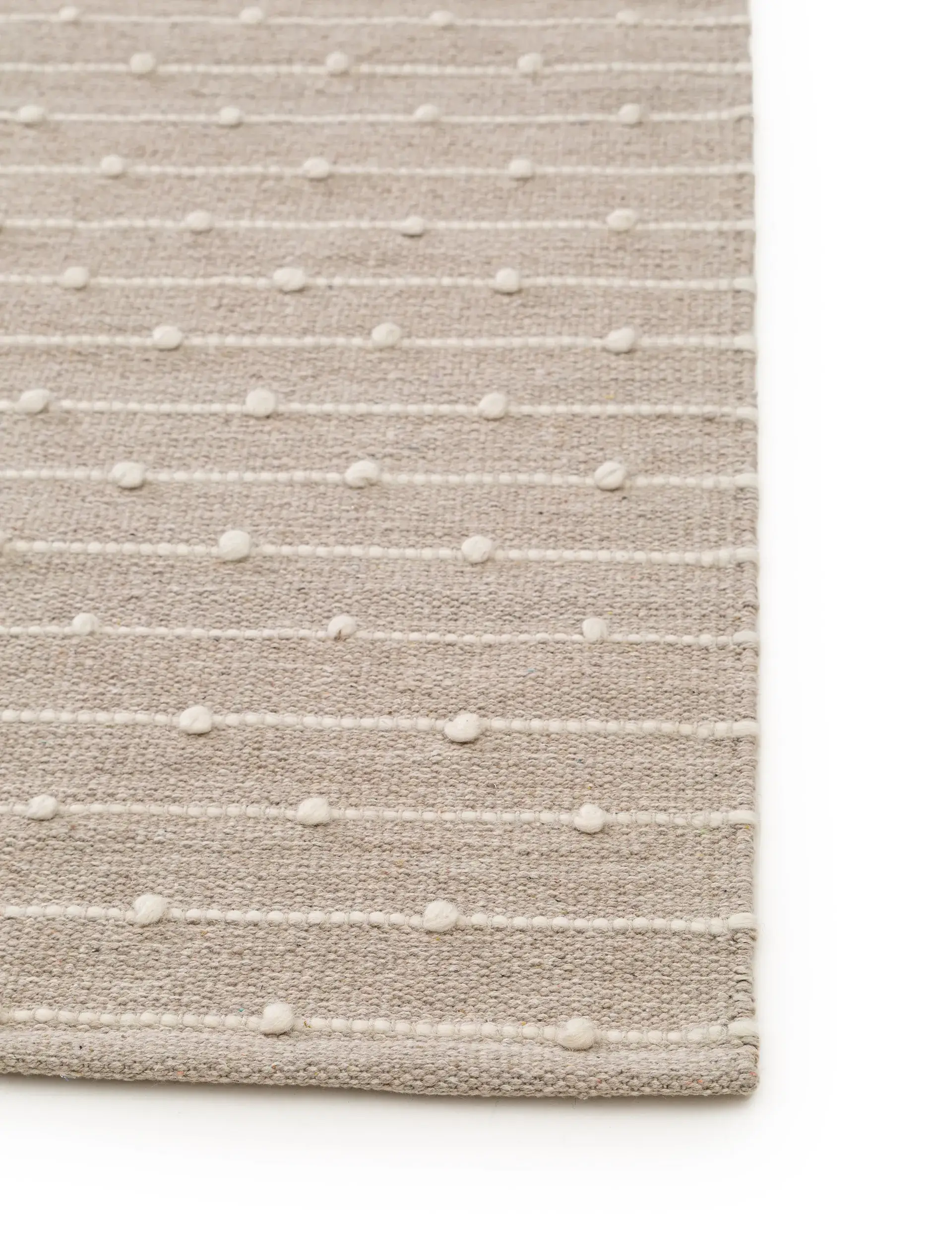 Rug made of 80% Baumwolle, 20% Wolle in Beige with a 80% Baumwolle, 20% Wolle high pile by Lytte
