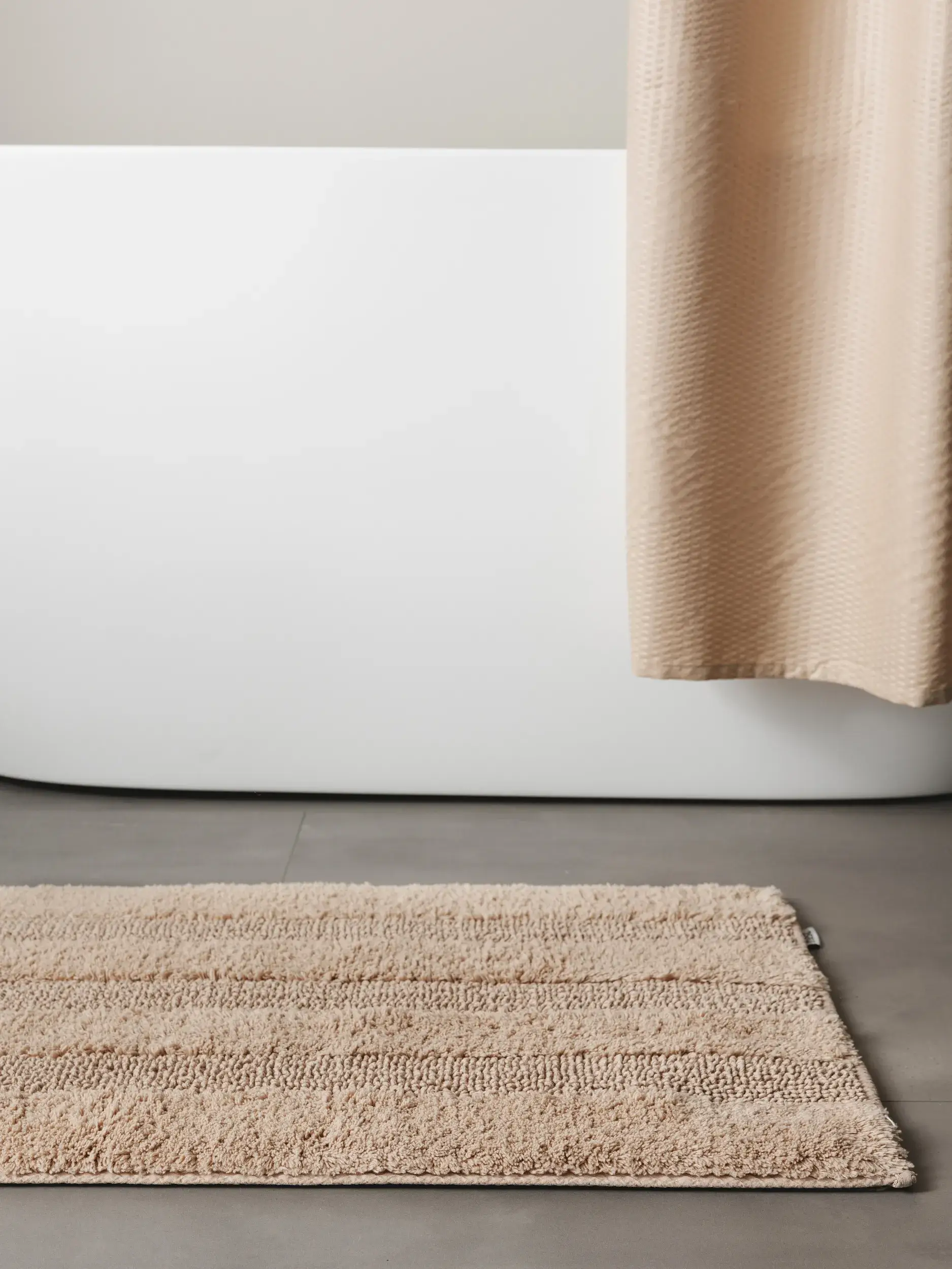 Badematte Ilka Beige Einfarbig-suunnittelussa, valmistettu 100% Baumwolleista, benuta Nestin toimesta