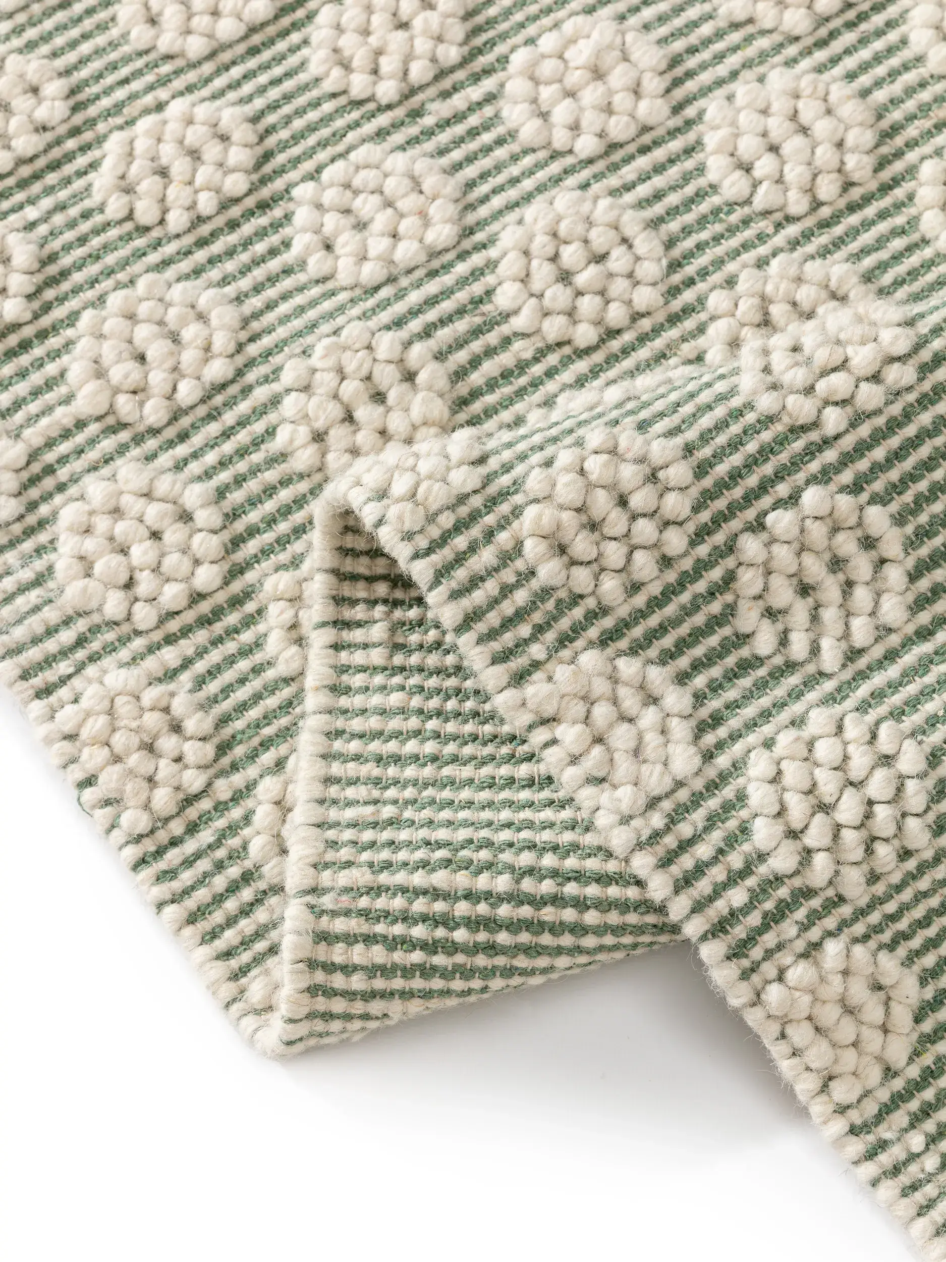 Teppich aus 60% Wolle, 40% Baumwolle in Grün mit 60% Wolle, 40% Baumwolle hohem Flor von Lytte