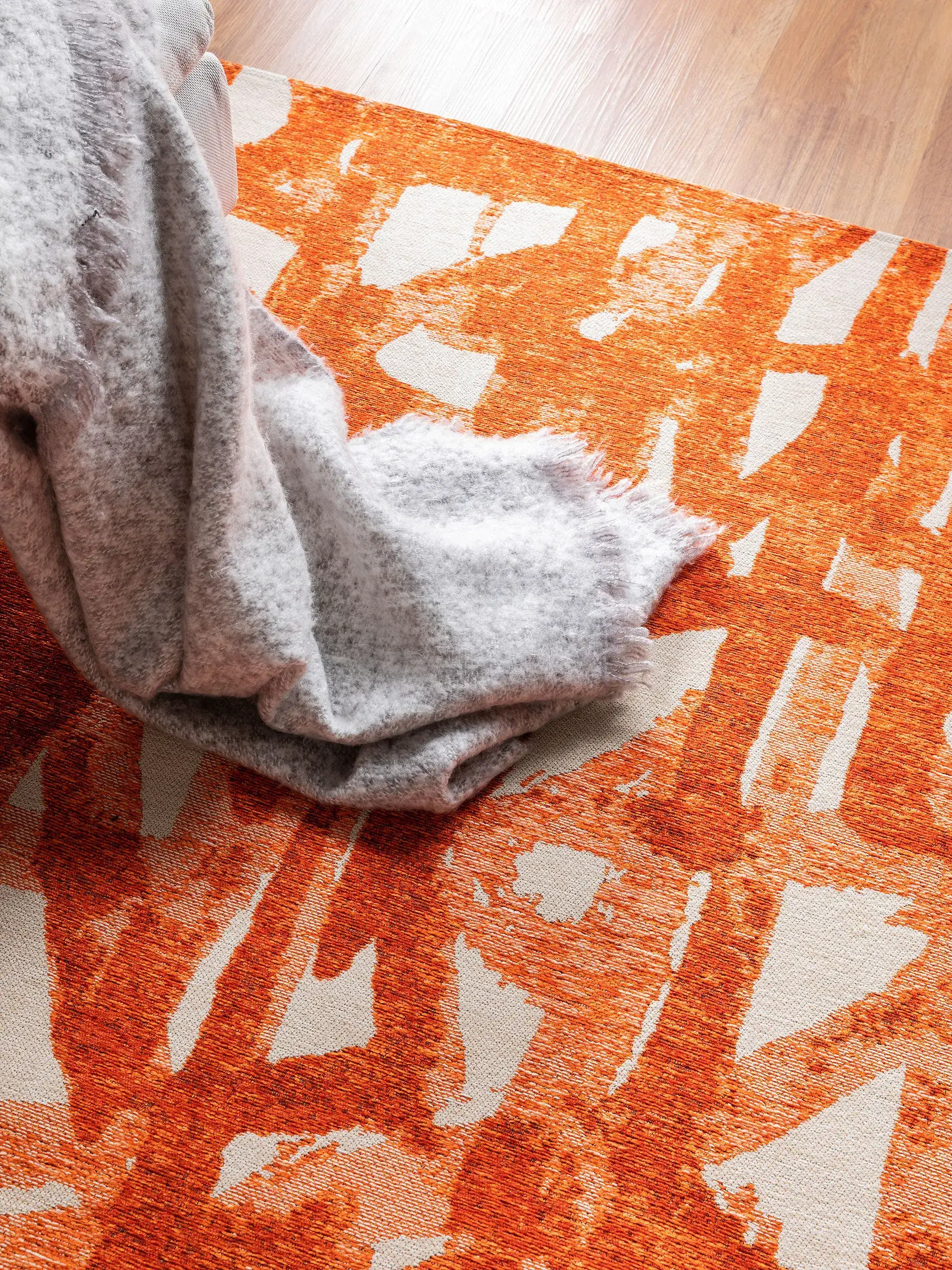 Teppich Stay aus 65% Baumwolle, 22% Polyacryl, 12% Polyester, 1% Latex in Orange von benuta