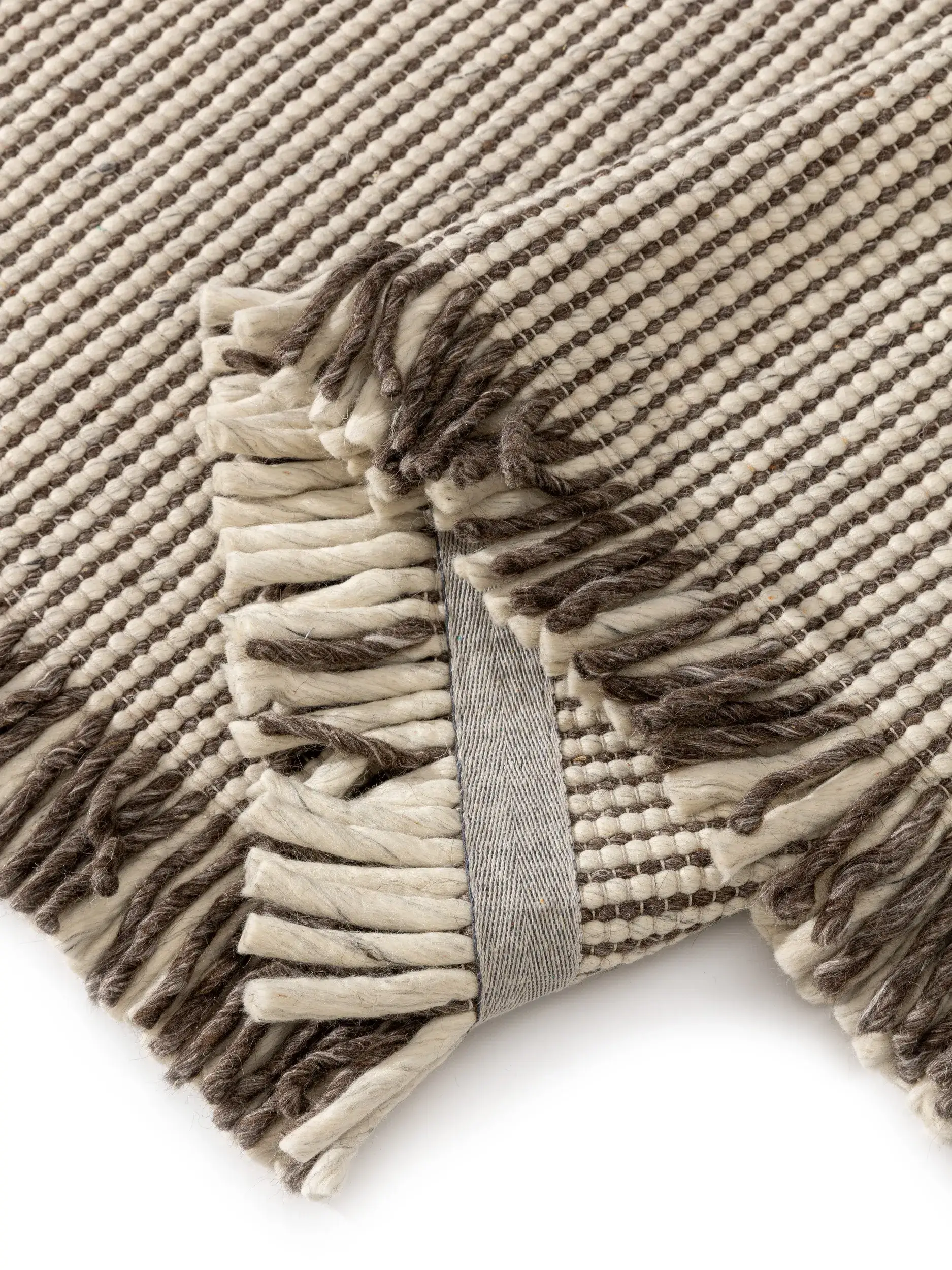 Matto 60% Wolle, 25% Polyester, 15% Viskosea värissä Beige 60% Wolle, 25% Polyester, 15% Viskose korkealla nukalla merkiltä benuta Pure