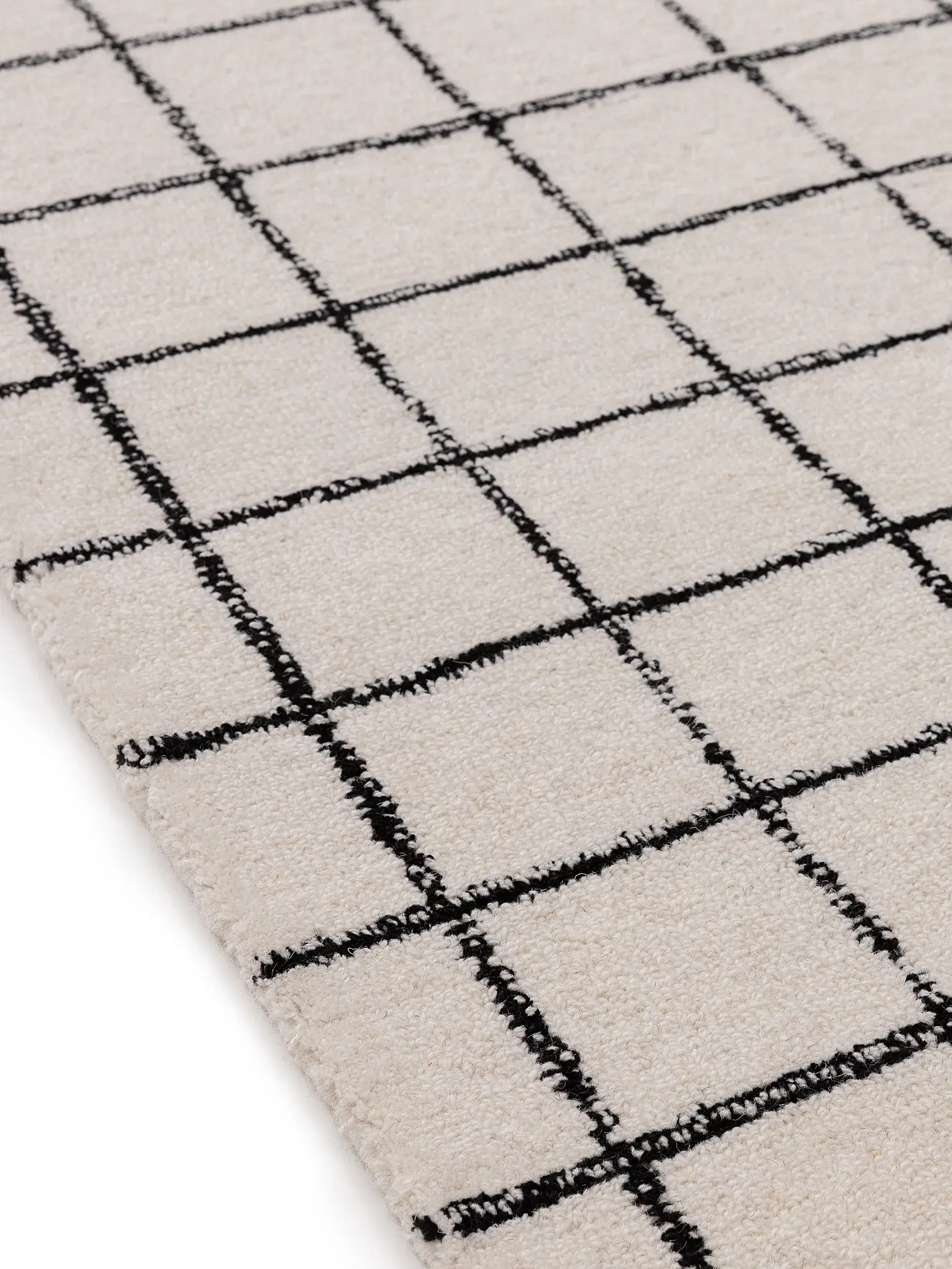 Teppich aus 100% Wolle in Schwarz/Weiß mit 100% Wolle hohem Flor von benuta Pop