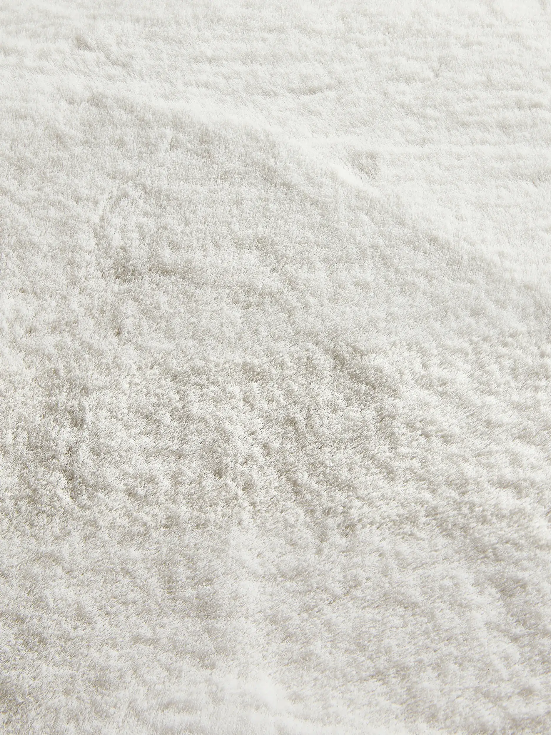 Rug made of 100% Polyester in White with a 100% Polyester high pile by benuta Finest