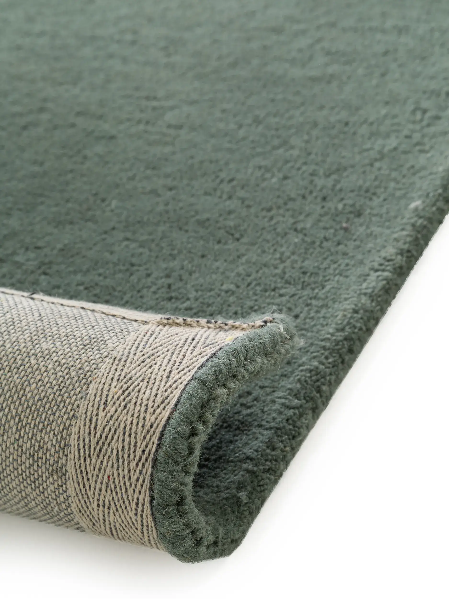 Teppich aus 100% Wolle in Grün mit 100% Wolle hohem Flor von benuta Nest