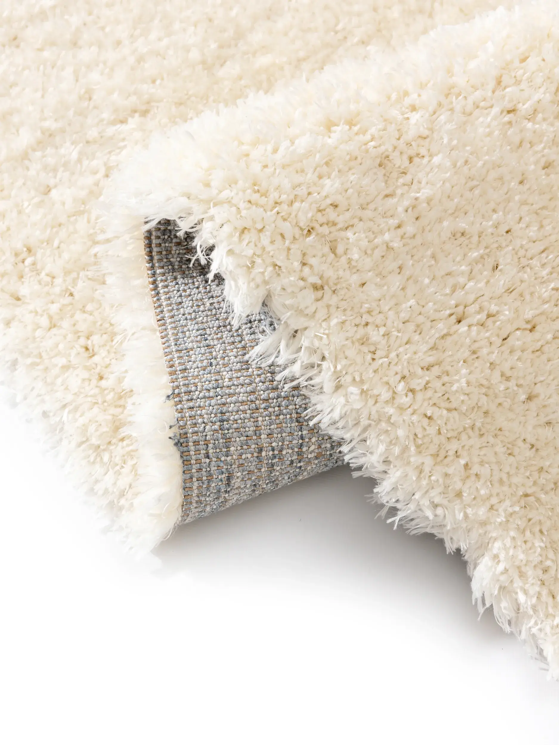 Rug made of 100% Polyester in White with a 100% Polyester high pile by benuta Pop